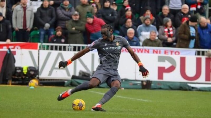 ARTHUR OKONKWO will definitely remain with Wrexham until the end of the season and the goalkeeper couldn’t be happier!