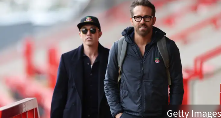 Inside Ryan Reynolds and Rob McElhenney’s career-saving donation to Wrexham trainer shop as owner & lifelong fan insists he ‘couldn’t have carried on’ without £3,500 donation