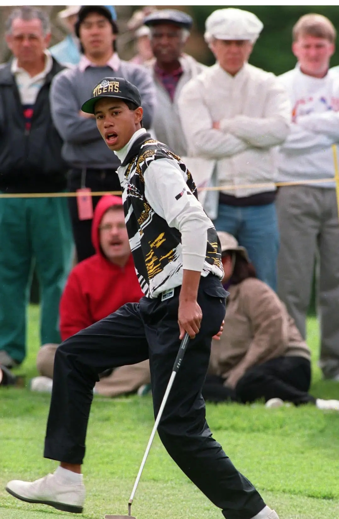 High school student Woods, 17, reacts after dropping a birdie putt on the 15th hole of the Los Angeles Open at the Riviera Country Club in Los Angeles, Calif., on 