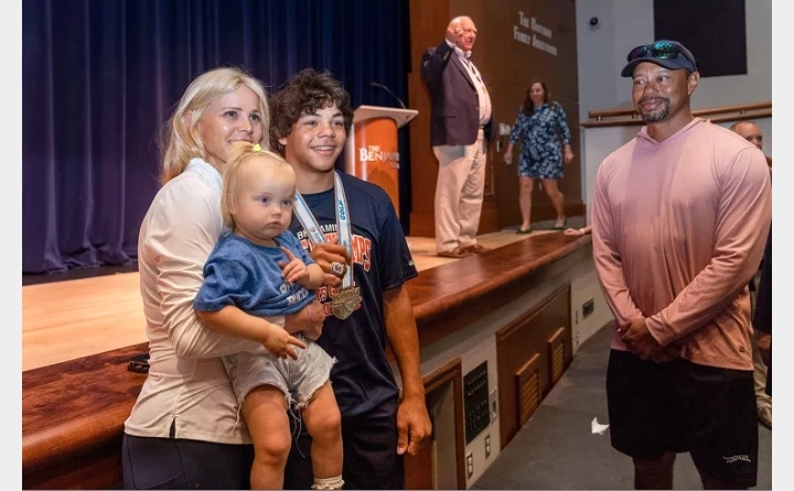 Tiger Woods and former wife Elin Nordegren rejoice as their 15-year-old son Charlie is awarded a golf championship ring.