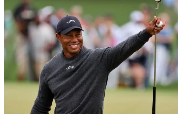 Tiger Woods gifts lucky fan a souvenir to remember during Masters practice round