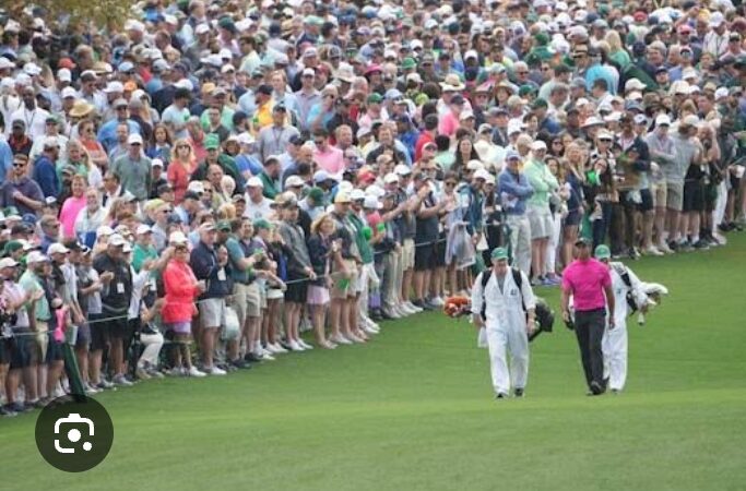 Tiger Woods appears to hit unfortunate fan on the head with wayward shot on the way to Masters… full details in comments sections