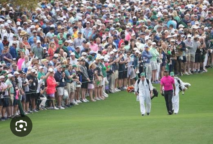 Tiger Woods appears to hit unfortunate fan on the head with wayward shot on the way to Masters… full details in comments sections