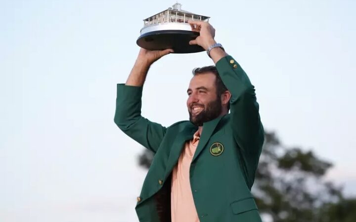 Scottie Scheffler holds the trophy after winning the Masters golf tournament at Augusta National Golf Club but was taking away from him by … full details below 👇👇