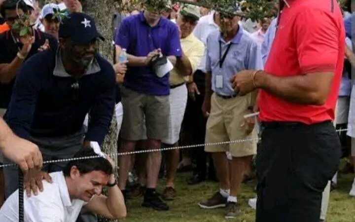 latest news;Tiger Woods  is disqualified for hitting a fan on the head    for calling him a loser.. full details below 👇