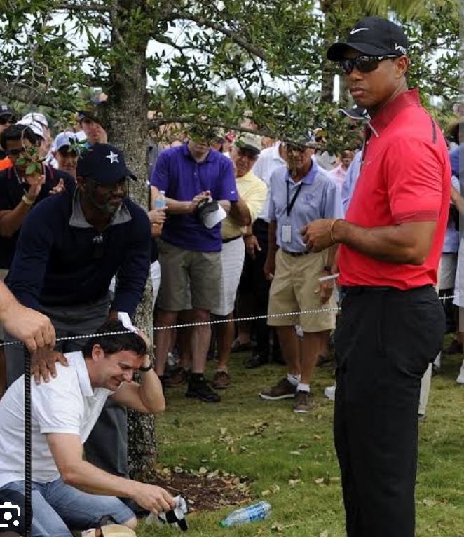 latest news; Tiger Woods hits fan in the head for calling him a loser…