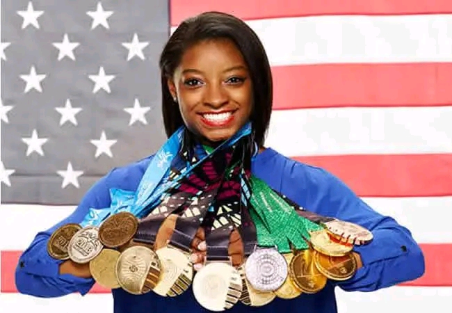 Simone Biles’ husband Jonathan Owens sparks outrage for wearing wife’s gold medal after Olympics win‘T