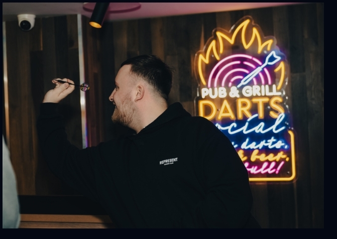 Breaking news; Luke Littler tries his hand at new Village Darts Social with PDC partner but…